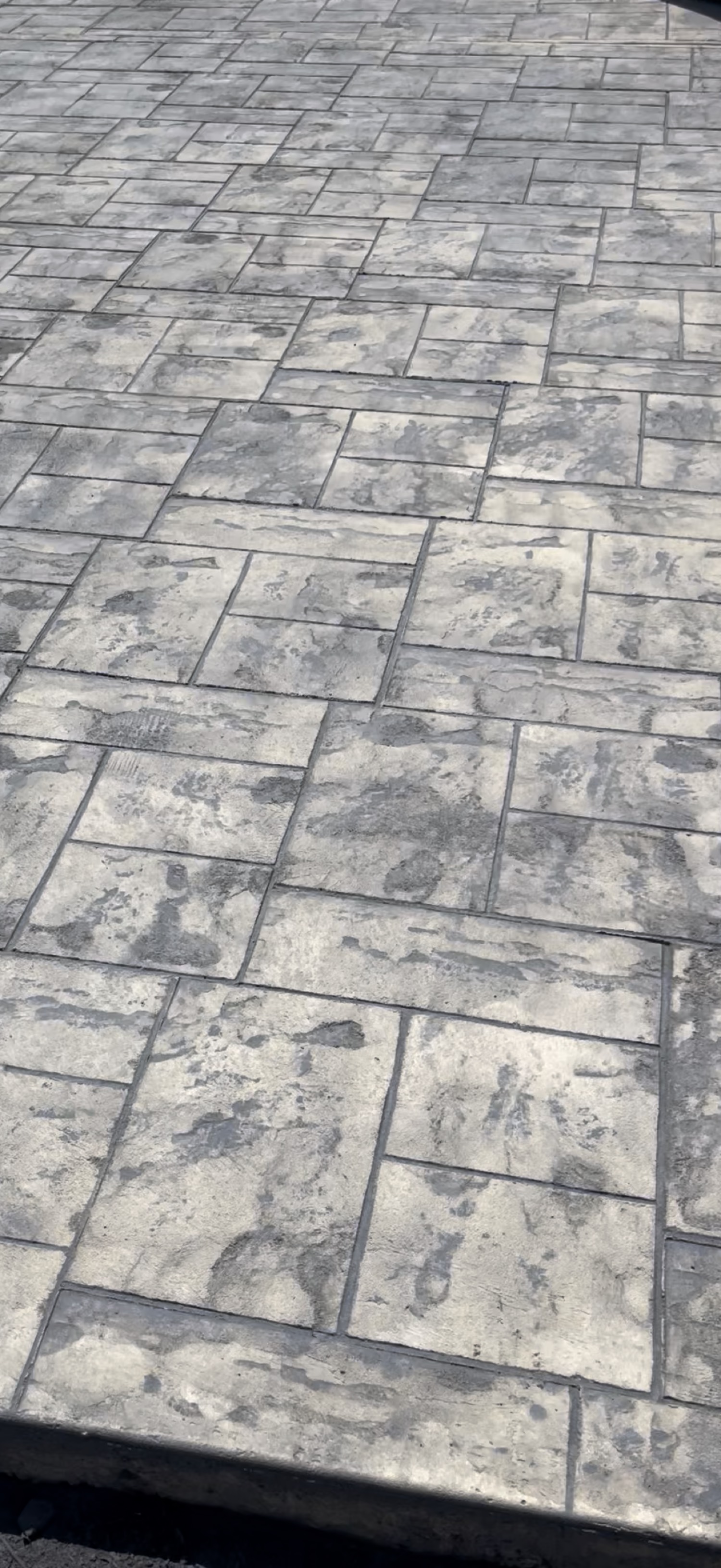Stamped concrete brick paver pattern