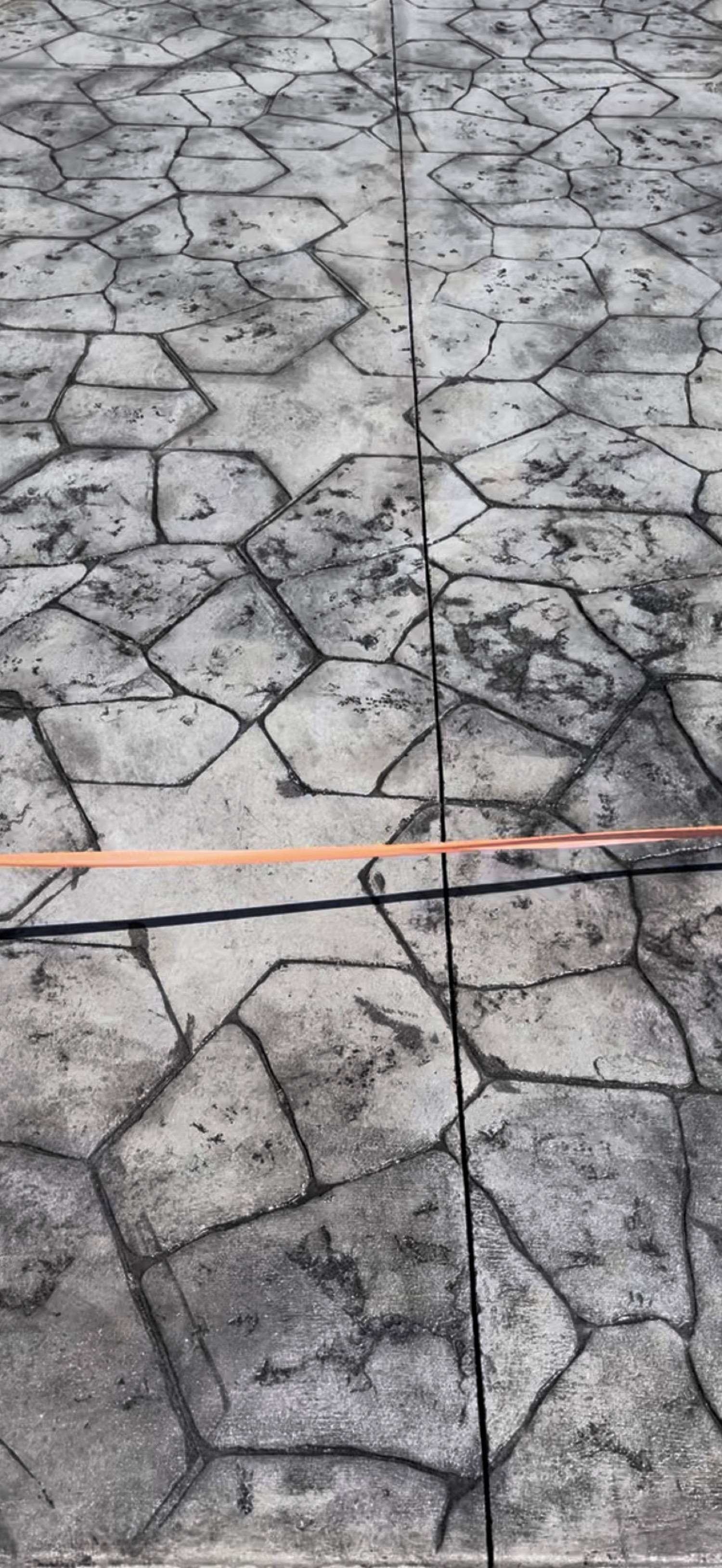 Stamped concrete with natural stone pattern